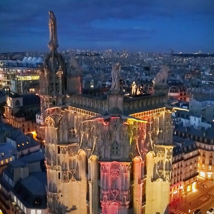 Saint-Jacques Tower above the rooftops of Paris in the evening light